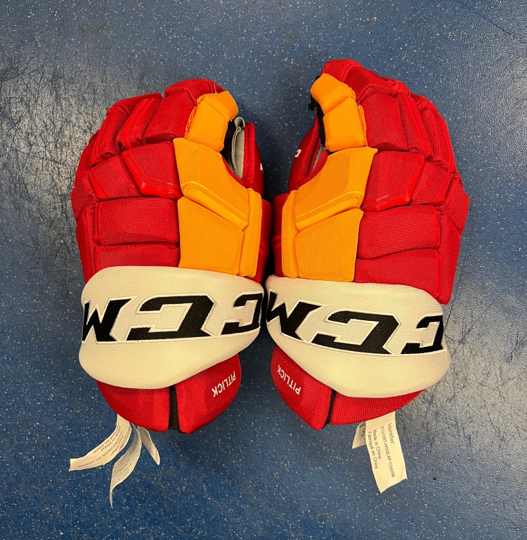 New CCM 14" Calgary Flames Pro Stock HGQLXP Hockey Gloves