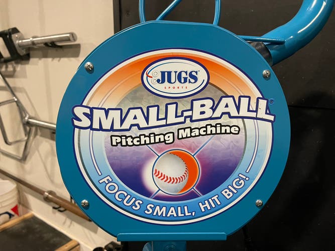 Jugs Small Ball Pitching Machine with bucket of balls