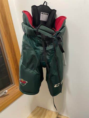 Used ccm HPUCLX Minnesota Wild pro stock hockey pants size medium
