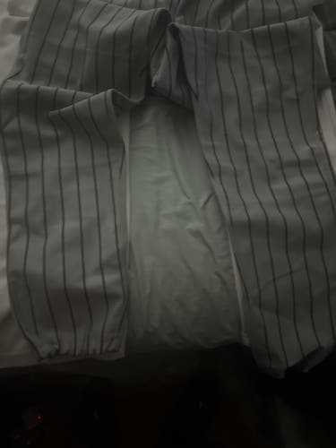2 pair of men XL never worn white baseball long pants & 1 pair of blk stripes grey pants