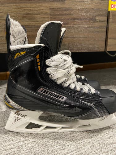 Used 8 1/4 Bauer Regular Width Supreme TotalOne MX3 Hockey Skates