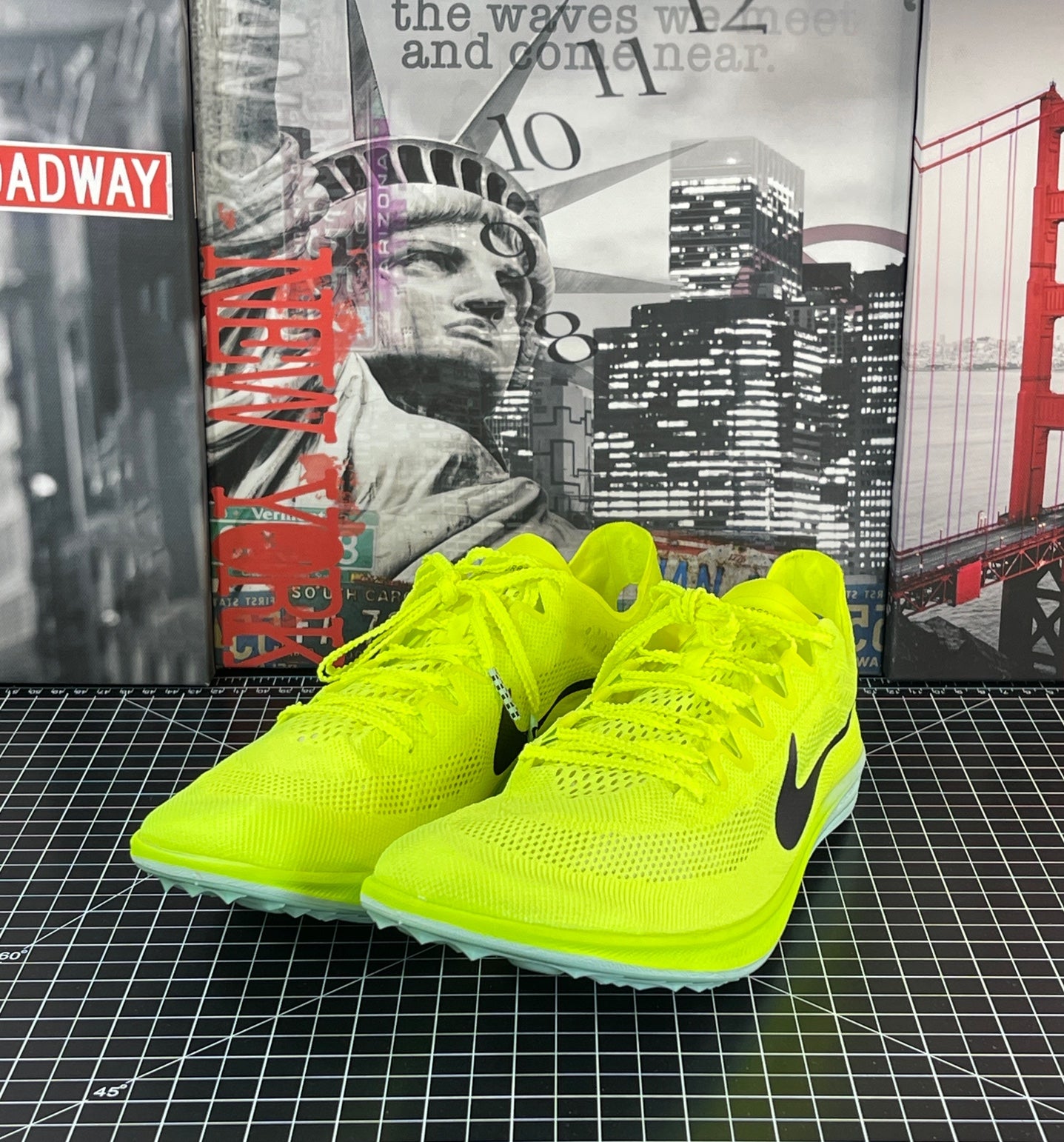 neon green track spikes
