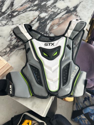 Used Large STX Cell V Shoulder Pads