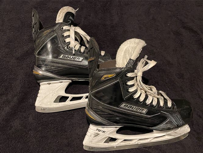 Intermediate Bauer Regular Width Size 4.5 Supreme 180 Hockey Skates