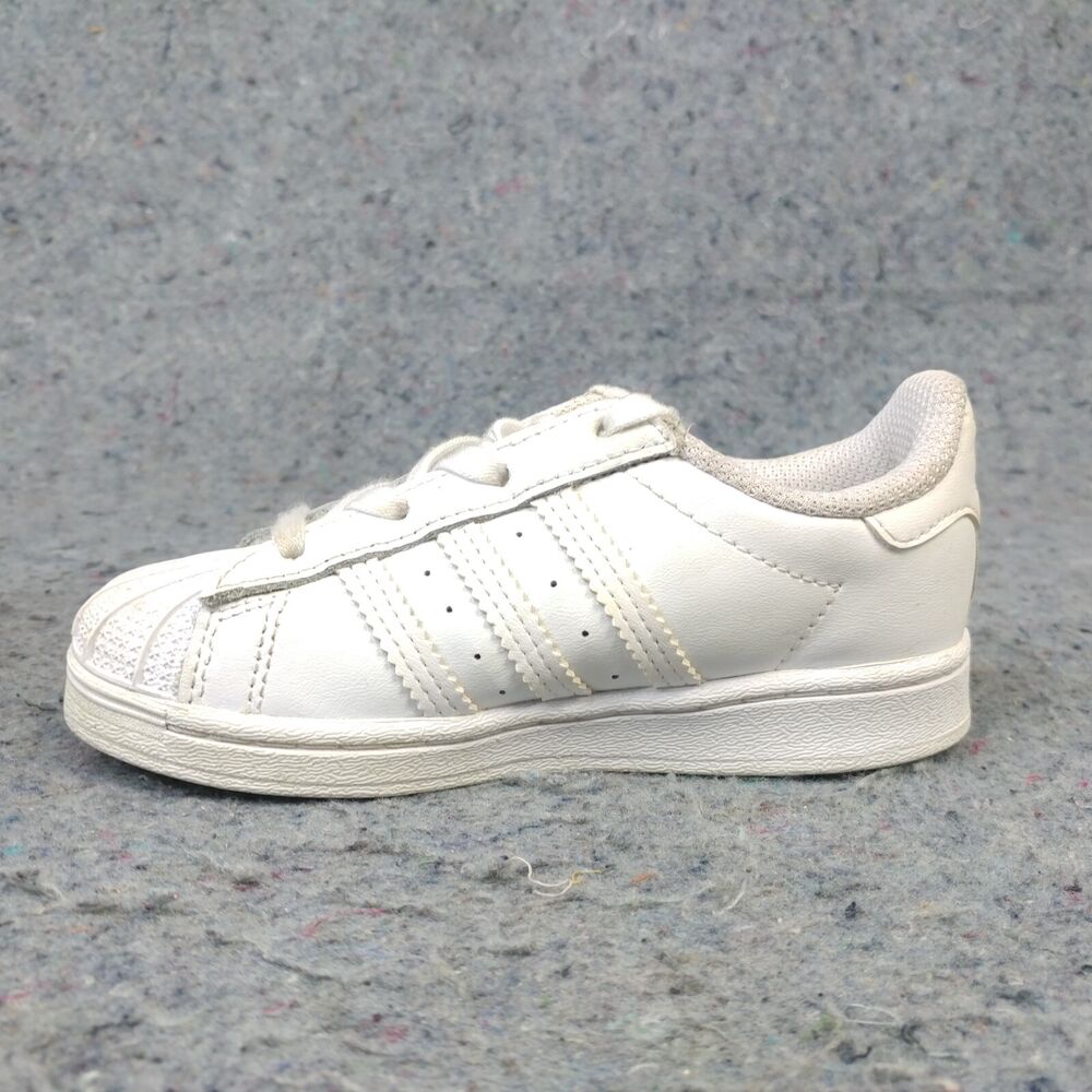 white shell toe adidas kids