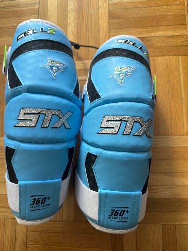 Brand new STX Cell V Lacrosse Arm Pads m/l. LIU team issued