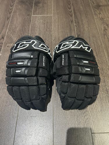LIKE NEW CCM 4ROLL PRO BLACK 13"