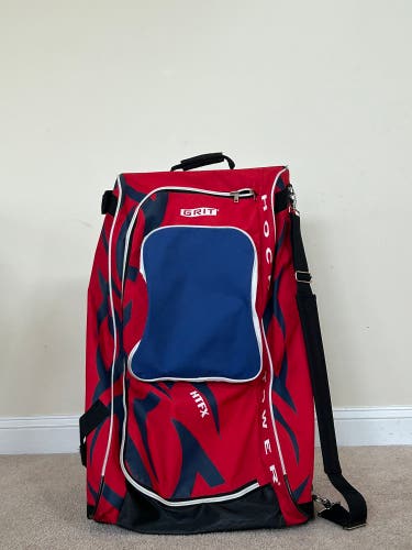 Red and blue GRIT hockey bag ‘33
