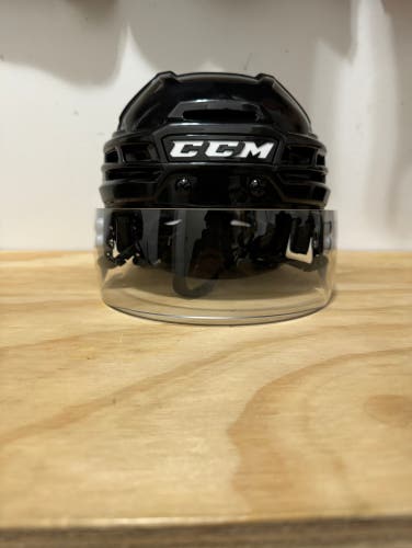 Used ccm tacks 910 hockey helmet size small with oakley visor size small