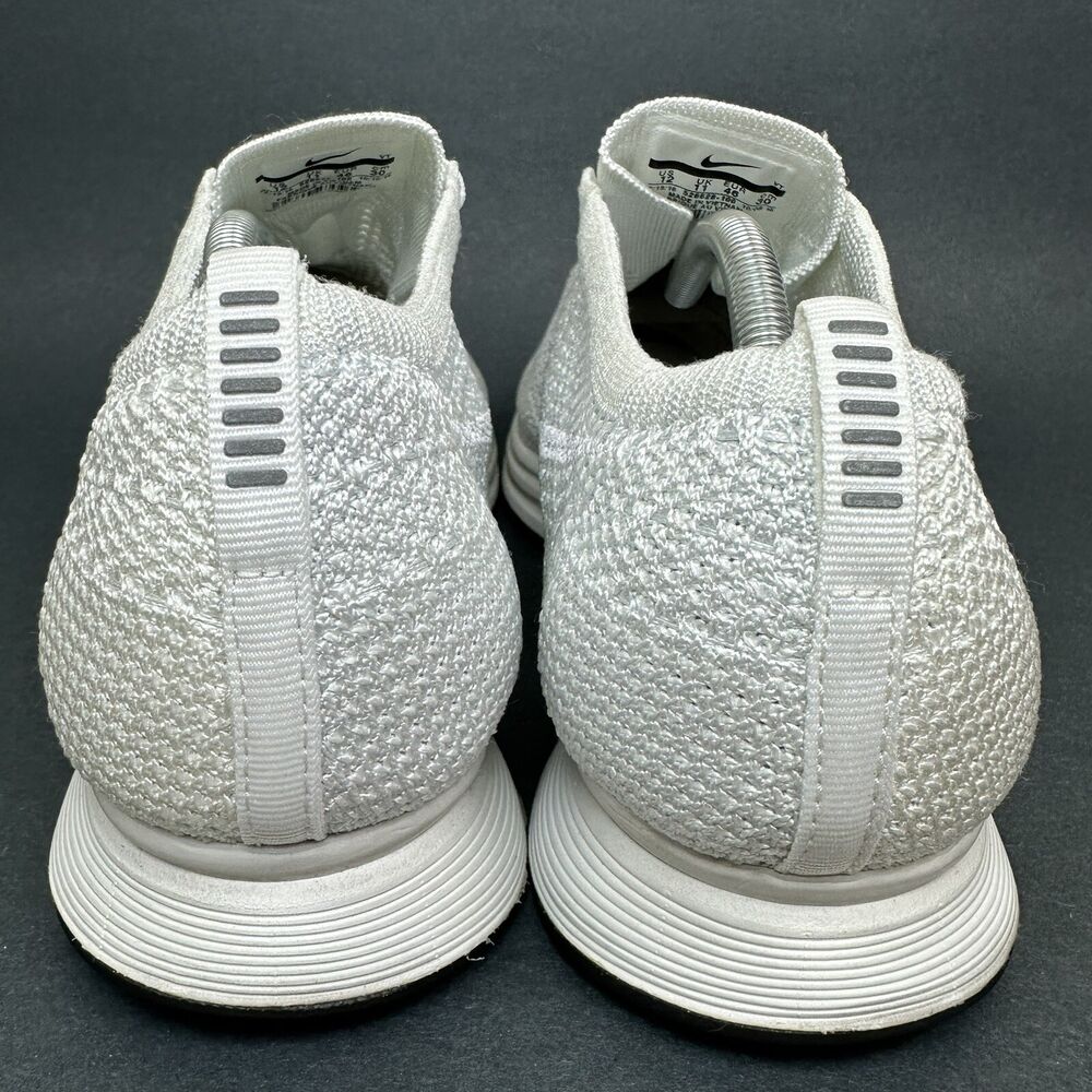 nike flyknit racer triple white