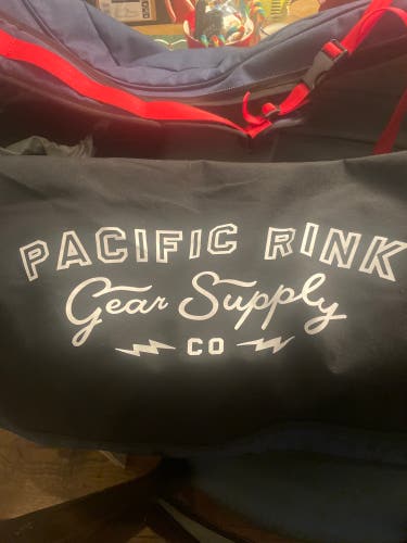 Pacific Rink Junior Player Bag. Blue and red.