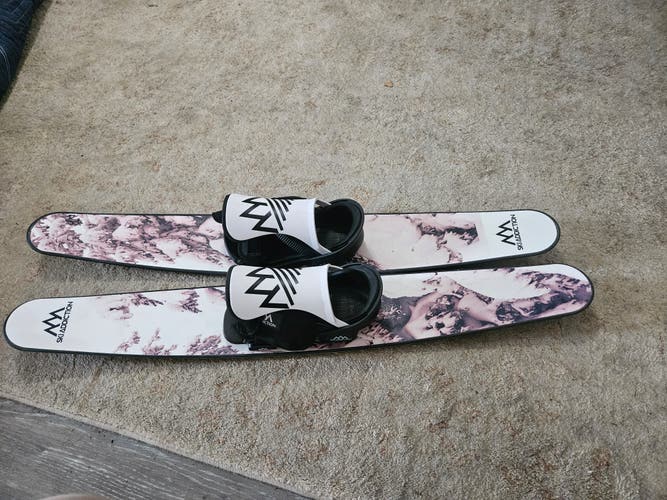 New tramp skis, never used