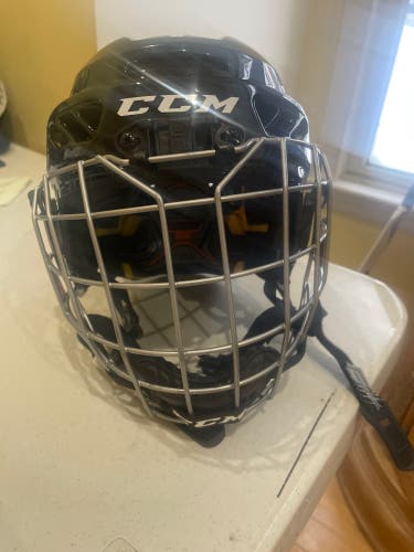Used hockey helmet and cage