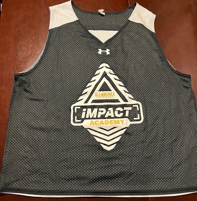 Impact Lacrosse Academy reversible black/white pinnie