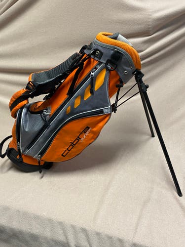 Used kid’s orange Cobra Bag