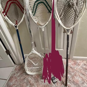 2 goalie sticks on hold for someone