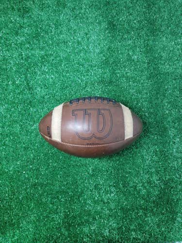 Mudded/prepped Adult Leather Wilson GST Football