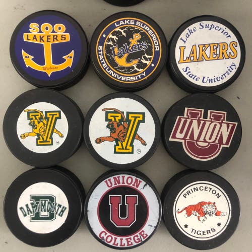 NCAA New Pucks - over 100 available