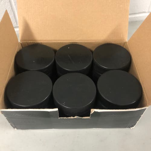 1 box of 18 brand NEW official pucks