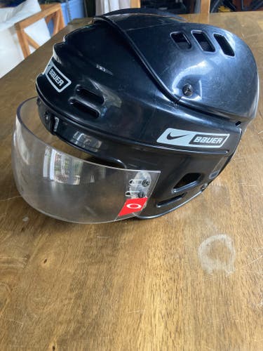Used Large Bauer Nike NBH1500L Helmet with Oakley Visor