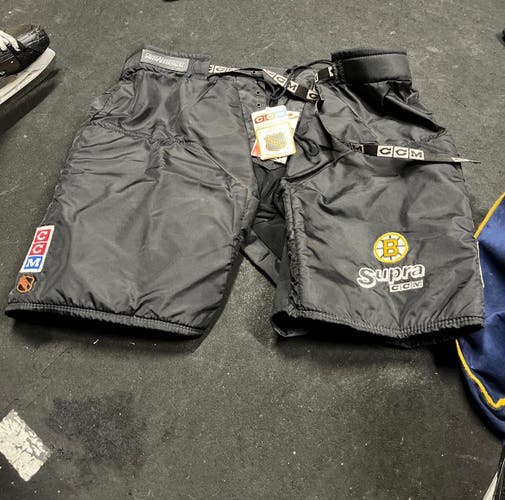 BRAND NEW BOSTON BRUINS CCM SHELL WITH TAGS