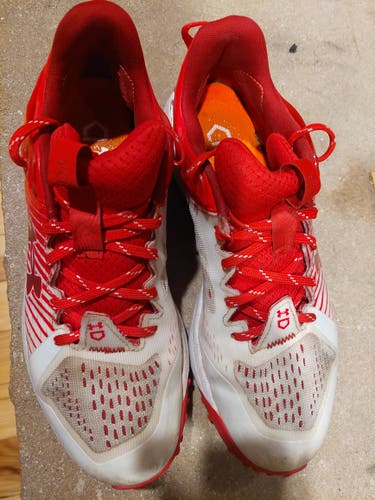 Men's size 9.5 red white UA turf shoes