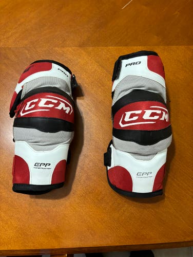 Used Large CCM  CCM U+PRO-NHL Elbow Pads