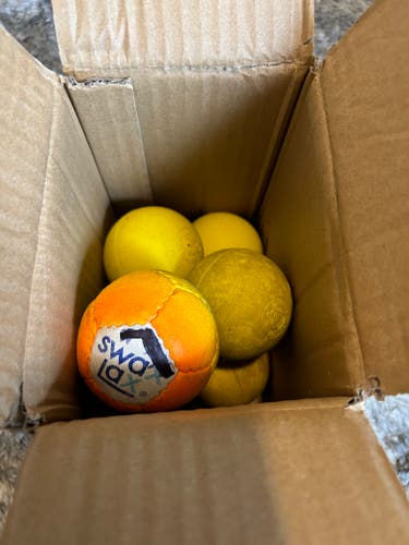 6 Lacrosse Balls + SwaxLax Ball