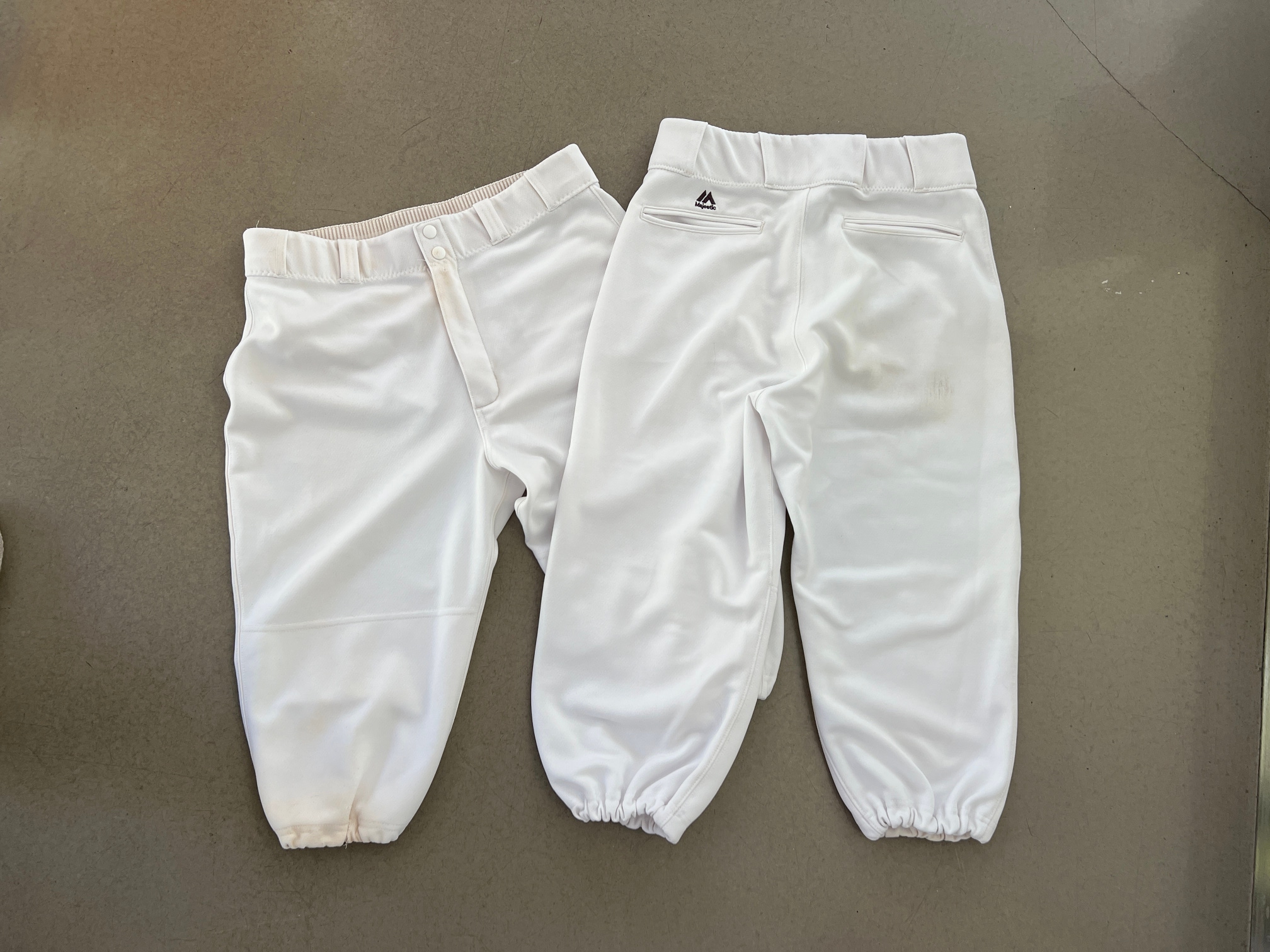 Lot of 2x pairs white baseball pants (Majestic, Adult S and Youth XL)