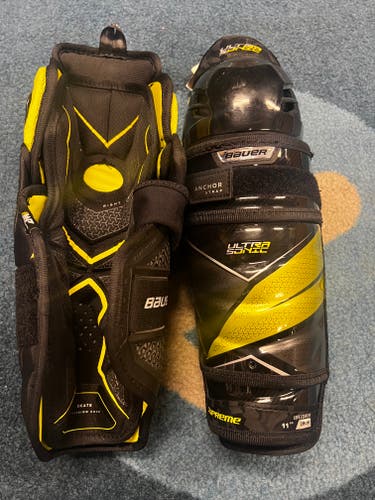 Junior New Bauer Supreme ultrasonic 11" Shin Pads