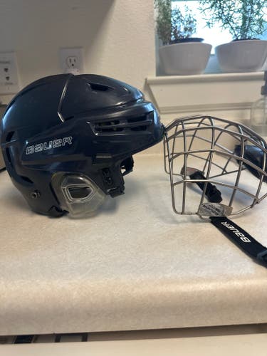 Used Small Bauer Re-Akt Helmet w/ Re-Akt Titanium Cage