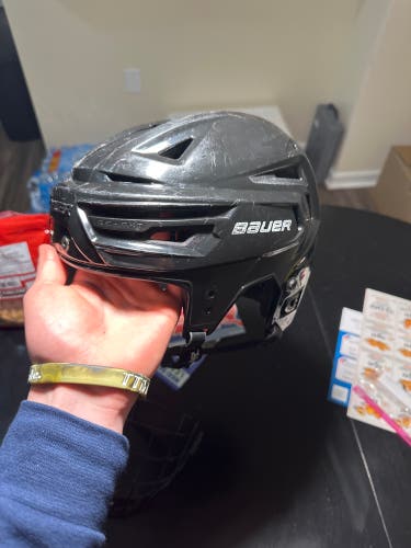 Used Large Bauer Re-Akt 150 Helmet