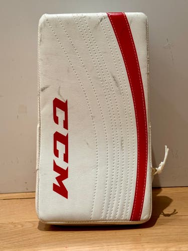 Used CCM Extreme Flex 400 Regular Goalie Blocker - Junior, White with Red.