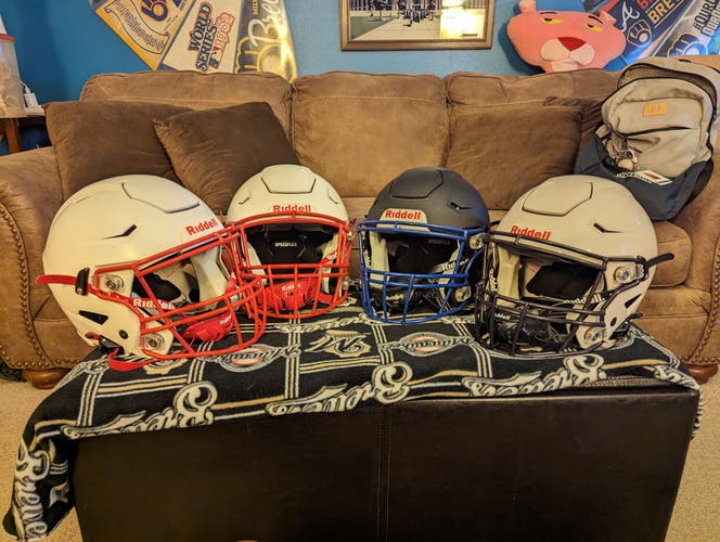 4 Adult Riddell SpeedFlex Helmets (2 large and 2 medium)