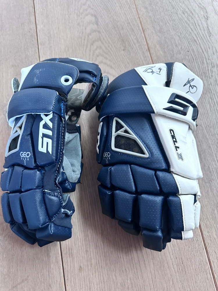 Used  STX Medium Cell Lacrosse Gloves
