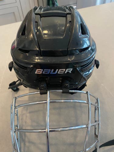 Used Large Bauer Re-Akt 150 Helmet
