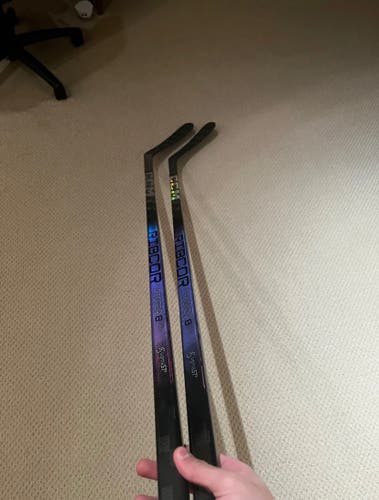 Two CCM Trigger 8 pro hockey sticks