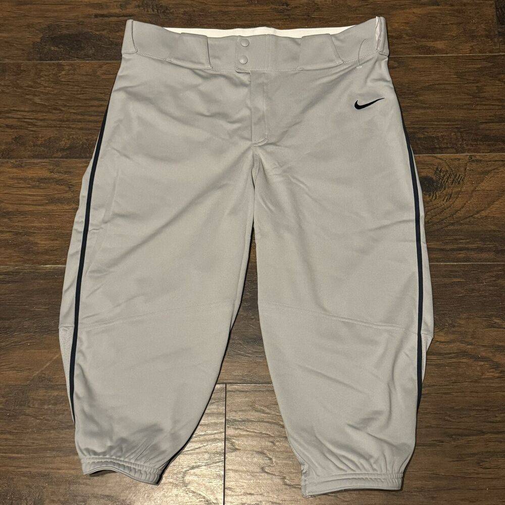 nike team vapor pro piped high pants