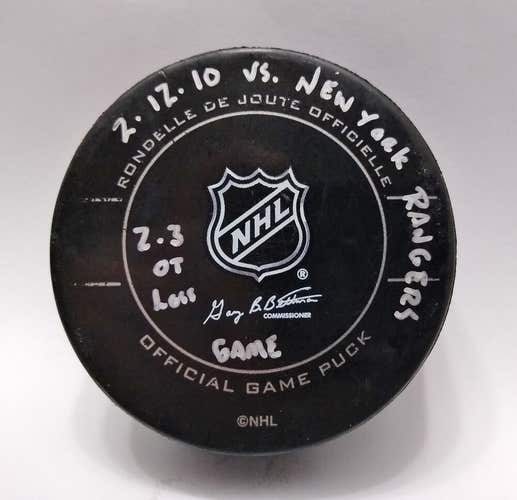 2-12-10 Penguins vs Ranger Game Used Hockey Puck Lundqvist Win Crosby 350th Game