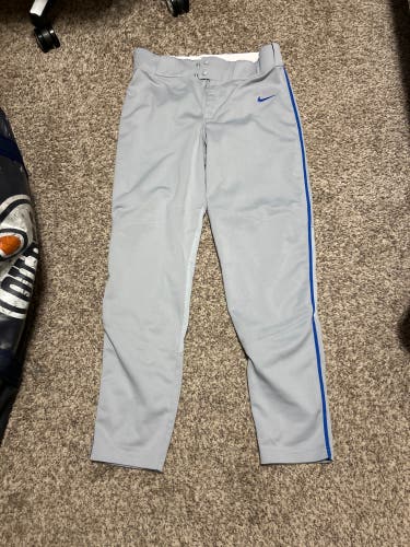 Nike baseball pants blue stripe