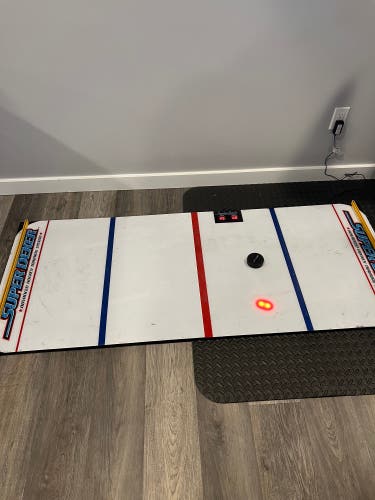 SuperDeker hockey stick handling aid