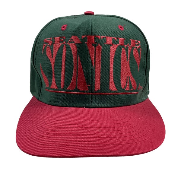 Vintage Seattle Supersonics NBA logo 7 snap back hat.