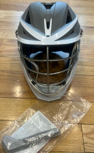 New. Unused matte gray Cascade XRS Helmet. white jaw, chin, strap, chrome cage. osfm