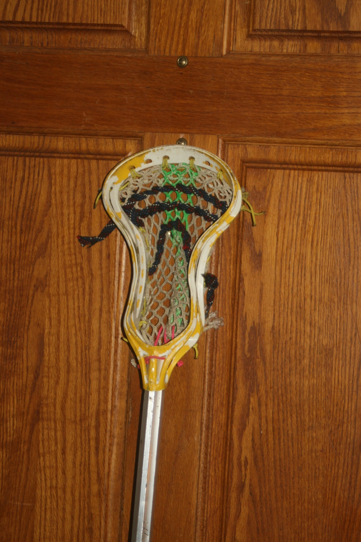 Used Warrior Defensive Lacrosse Stick 61 inches