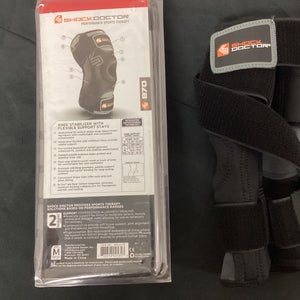 Knee stabilizer with flexible support-870
