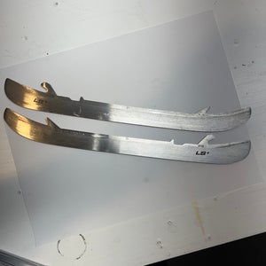 A pair of used Bauer LS+ 272 mm blades/runners.