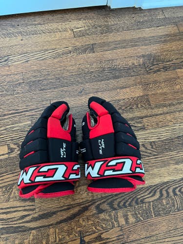 Used CCM 4R Lite Gloves 13"