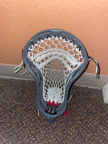 Used Attack & Midfield STX Strung Surgeon 900 Head
