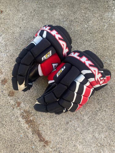 Used Alkali Gloves 10"