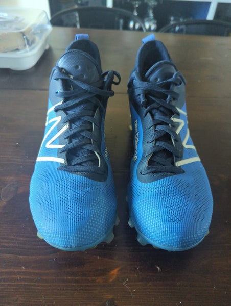 Used New Balance FreezeLX V4 Mid Lacrosse cleat. Men's size 9.0